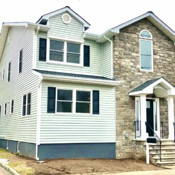 House Renovation and Addition with GAF Roofing, Alside Conquest Siding, Andersen Windows, Portico with Boral Cultured Stone Veneers in Fairlawn, Bergen County NJ