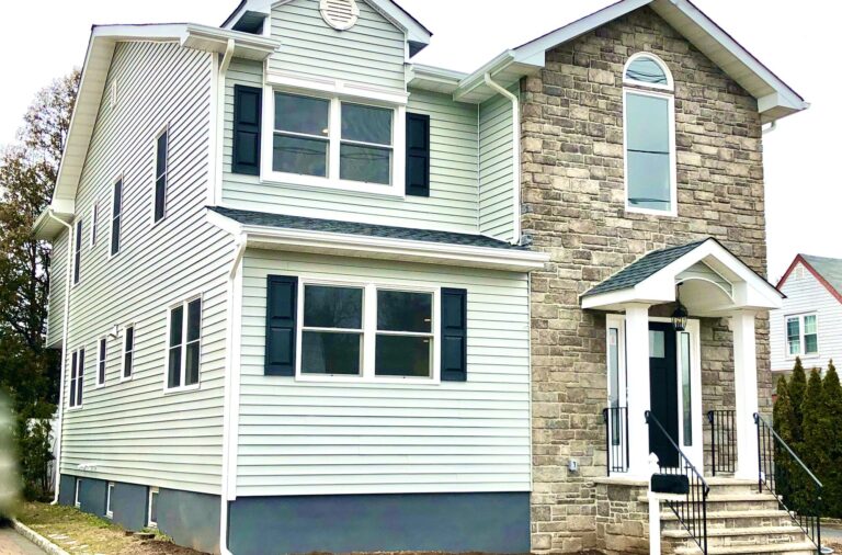 House Renovation and Addition with GAF Roofing, Alside Conquest Siding, Andersen Windows, Portico with Boral Cultured Stone Veneers in Fairlawn, Bergen County NJ