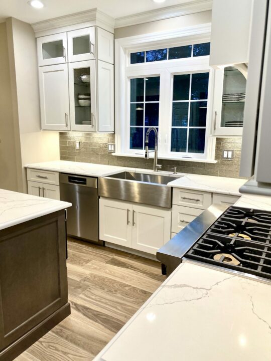 Large Window and Transom over Sink, Stainless Stel Farmhouse Sink, Custom Wood Cabinetry, Viking Appliances in Somerset NJ