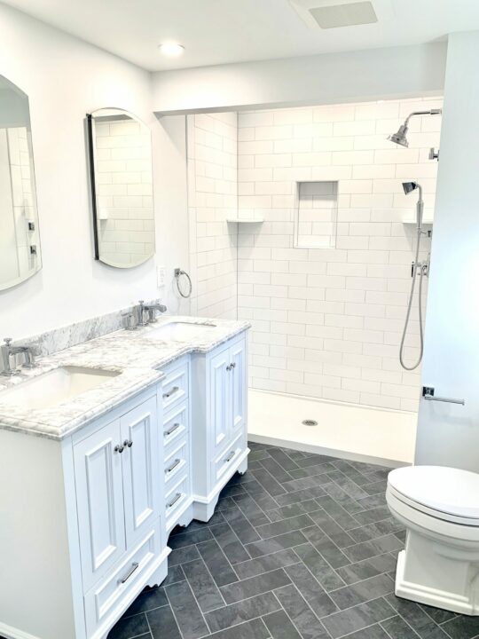 Fixture Bath with Wood Vanity and Marble Top, Subway Tiled Shower Wall in West Caldwell, Essex County NJ