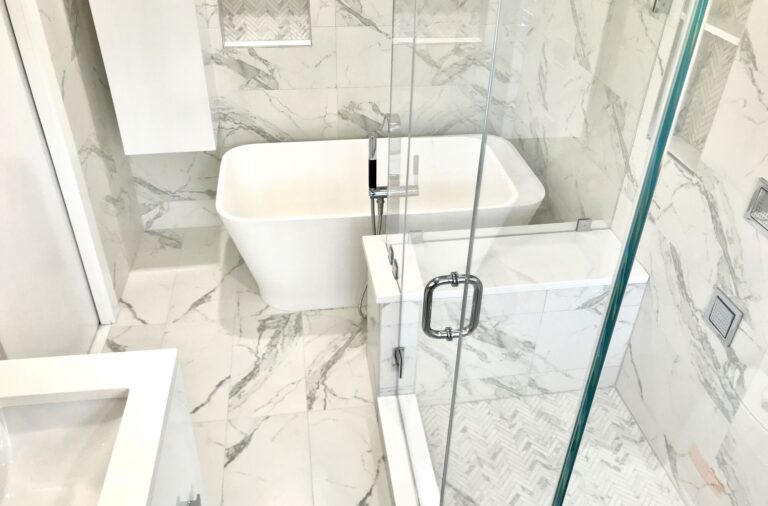 Freestanding Tub, Custom Shower _ Bench, Tile Walls in a compact bathroom in Maplewood, Essex County NJ