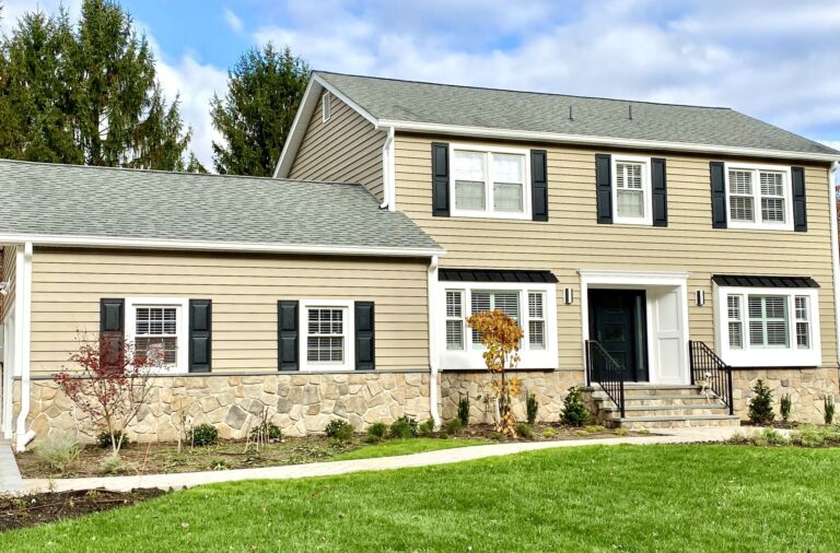 Prodigy Siding Tuscan Clay, Boral Dressed Fieldstone, Black Metal Roofing, Azek Trim, Therma Tru Front Door, Cambridge Pavers Walkway and Driveway in Randolph, Morris County NJ