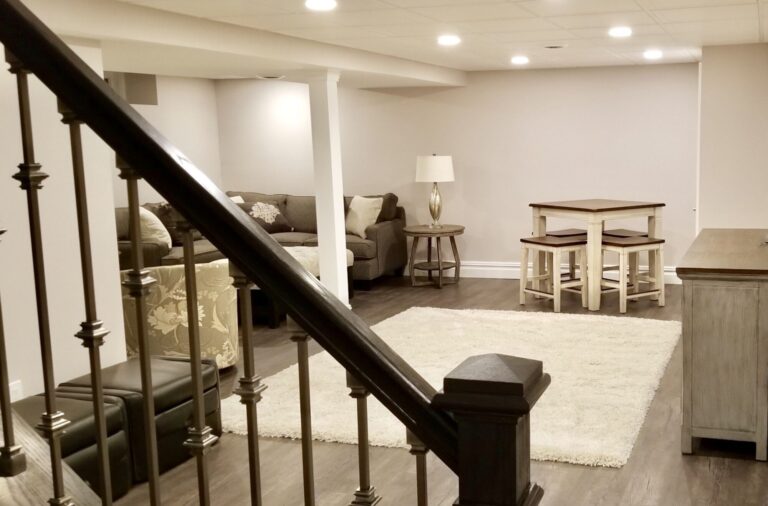 Basement with Mold and Mildew Resistant Drywall, Vinyl Plank Flooring, Acoustic Ceiling, Wood and Metal Rail, LED Lighting In East Brunswick, Middlesex County NJ