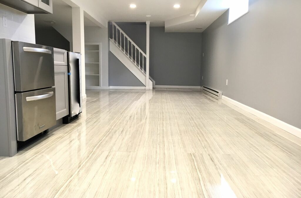 Basement Remodeling with Porcelain Tile Flooring, Kitchenette and Built In Storage in Clifton, Passaic County NJ