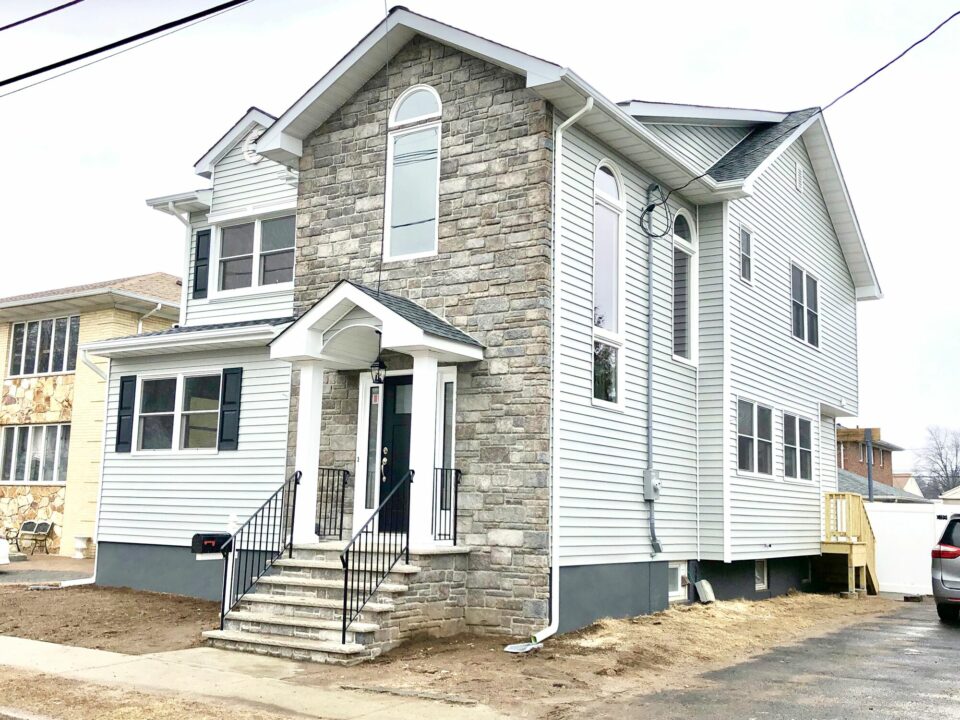 Add-a-Level Addition with GAF Roofing, Alside Conquest Siding, Andersen Windows with Front Steps and Portico in Fairlawn, Bergen County NJ