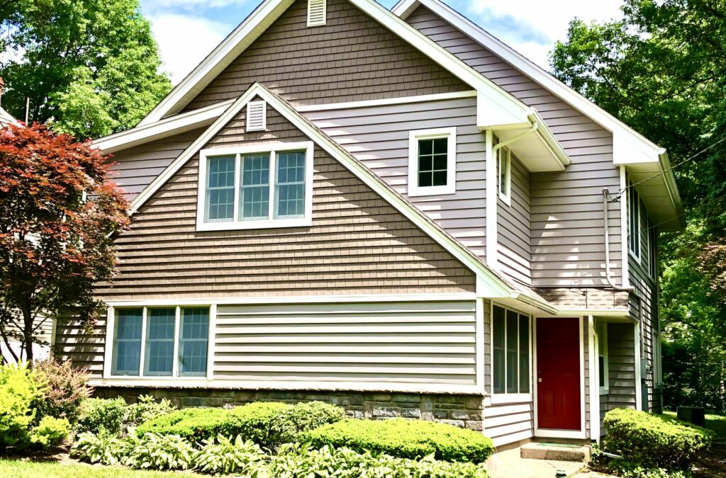 Certainteed Insulated Clapboard Vinyl Siding with Cedar Impression Shakes and Boral Cultured Stone in Ridgewood, Bergen County NJ