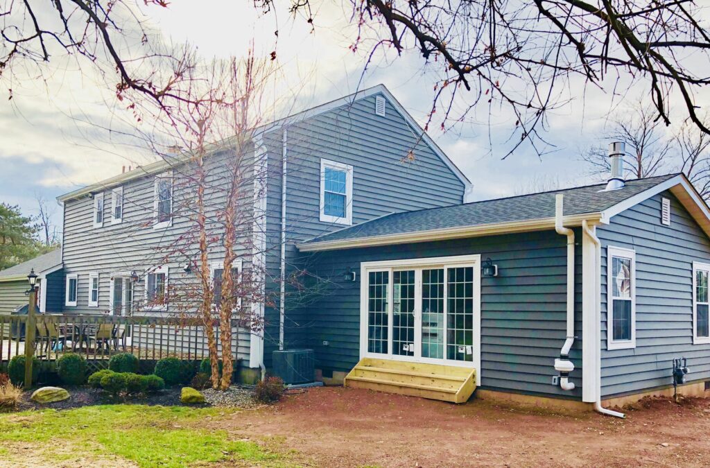 Family Room Addition with 4-panel Patio Slider Door, Gas Fireplace, Prodigy Siding and GAF Roofing in Hillsborough, Somerset County NJ