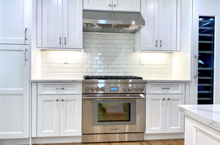 Kitchen with Shaker Cabinets, Thermador Appliances, Stone Countertops, Subway Tile Backsplash and Wood Floors in Cranford, Union County NJ