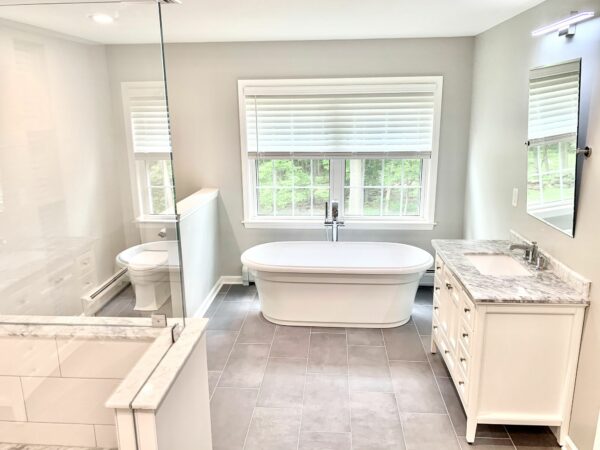 Master Bath in North Jersey with Kohler Fixtures, Ceramic Tile Flooring, Wood Cabinetry with Undermount Sink