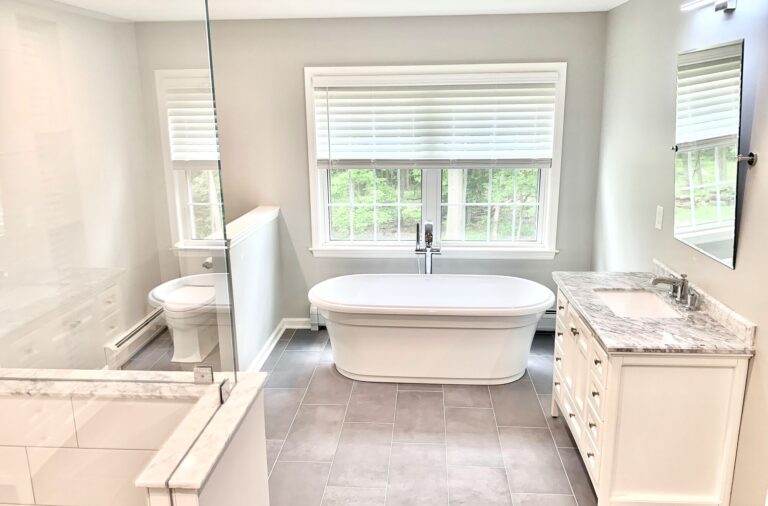 Master Bath in North Jersey with Kohler Fixtures, Ceramic Tile Flooring, Wood Cabinetry with Undermount Sink