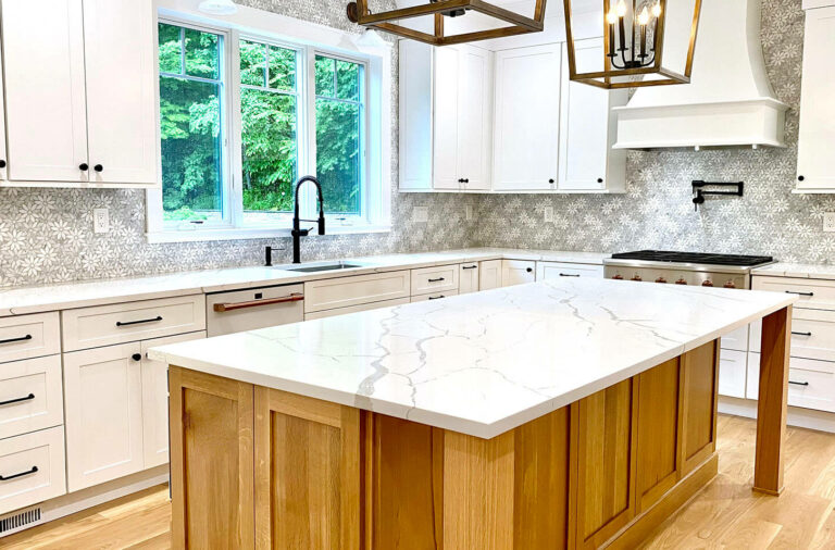 Calacatta Paris Quartz Countertop with Mosaic Marble Backsplash