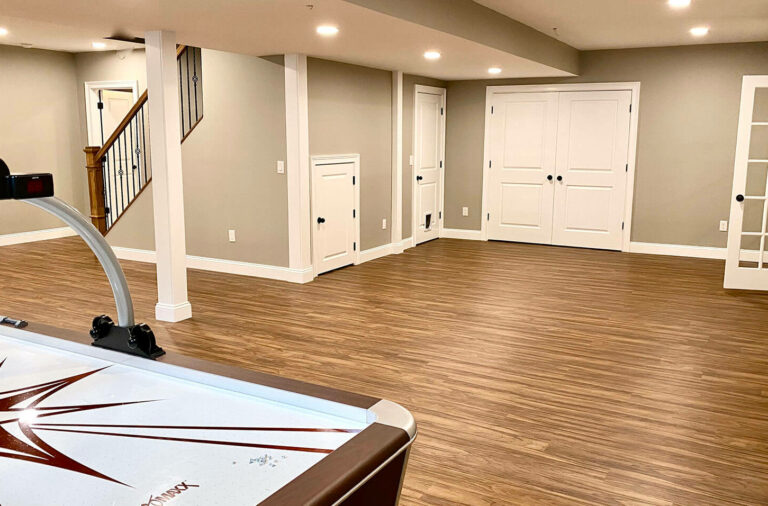 Basement Remodel with LVP Flooring, Ductless Heating _ Cooling, Oak Stairs and Metal Balusters