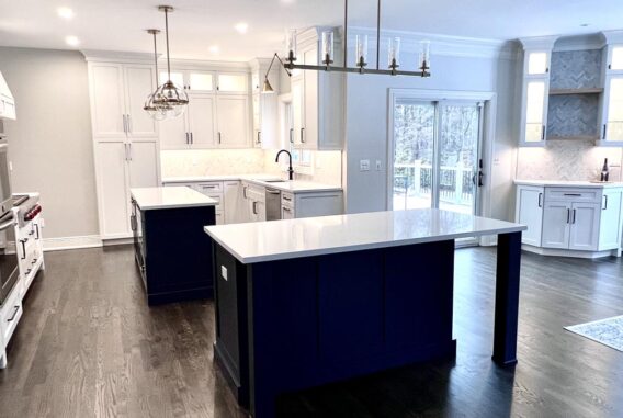 Sparta, NJ kitchen remodeling project with blue prep and seating island bar cabinetry.