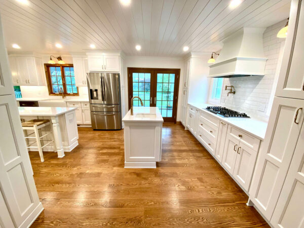 Kitchen with Wood Shaker Cabinetry, Red Oak Wood Flooring, Andersen Windows and Doors, MDF Beaded Ceiling