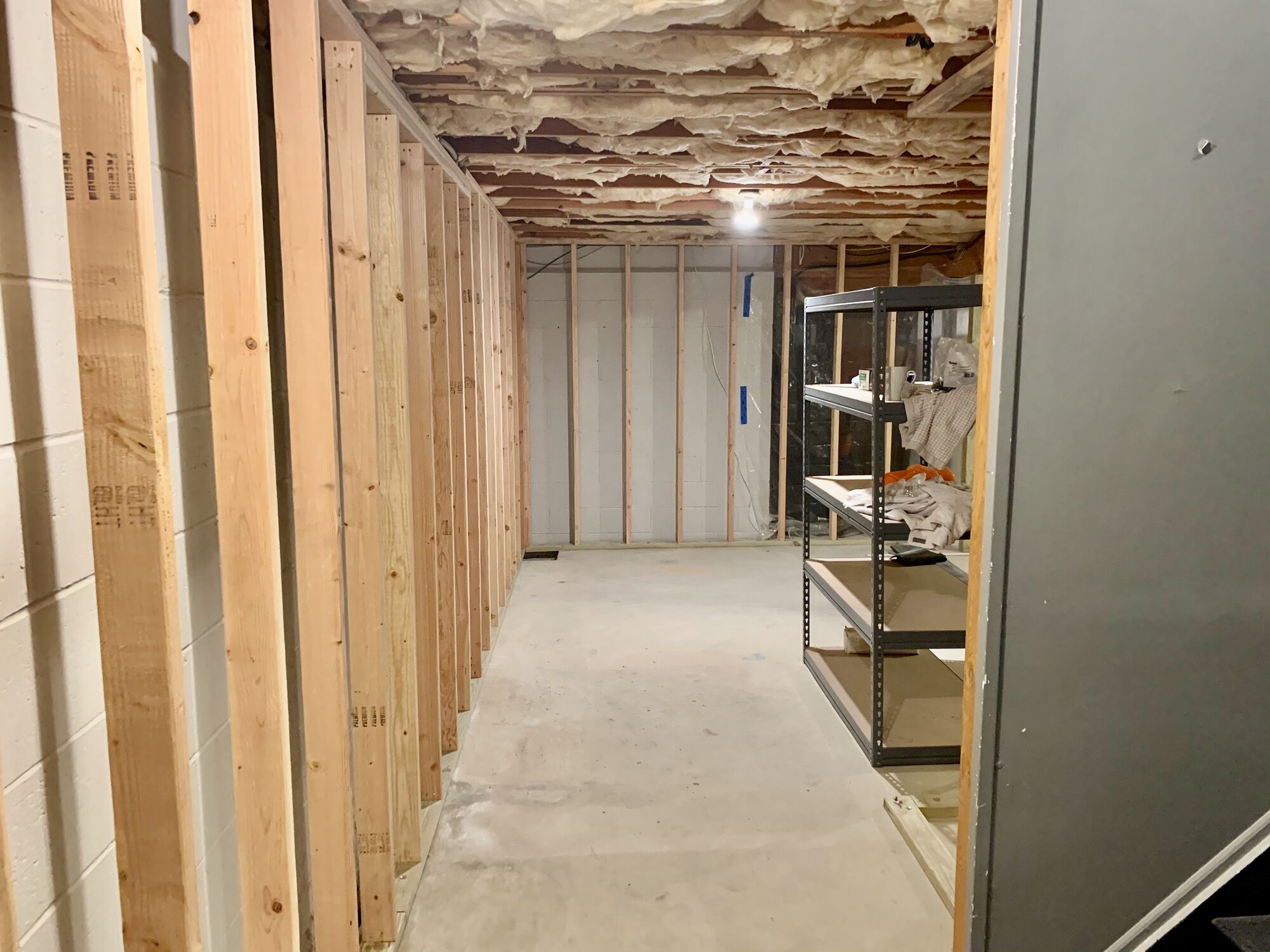 Basement Remodeling with Steel Beam Install ed to Remove a Column, Custom Trim and Paneling, Luxury Vinyl Plank Flooring, LED Lighting, Laundry _ Full Bath in Sparta, Sussex County NJ