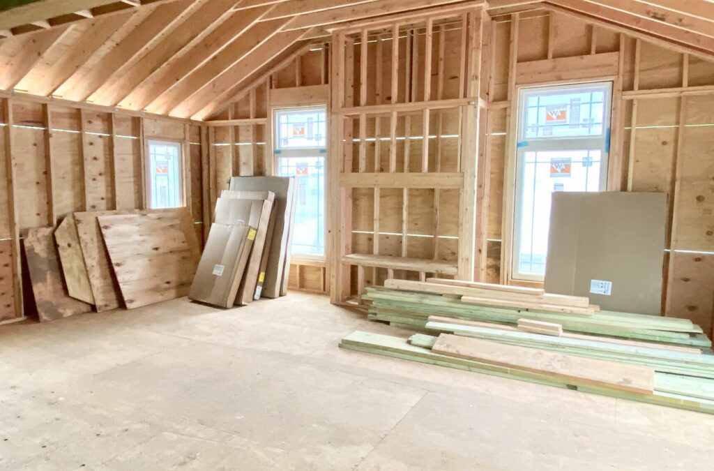 Family Room Addition with Vaulted Ceilings, Wood Flooring, Stone Fireplace, Andersen Windows and Patio Doors in Cranford, Union County NJ