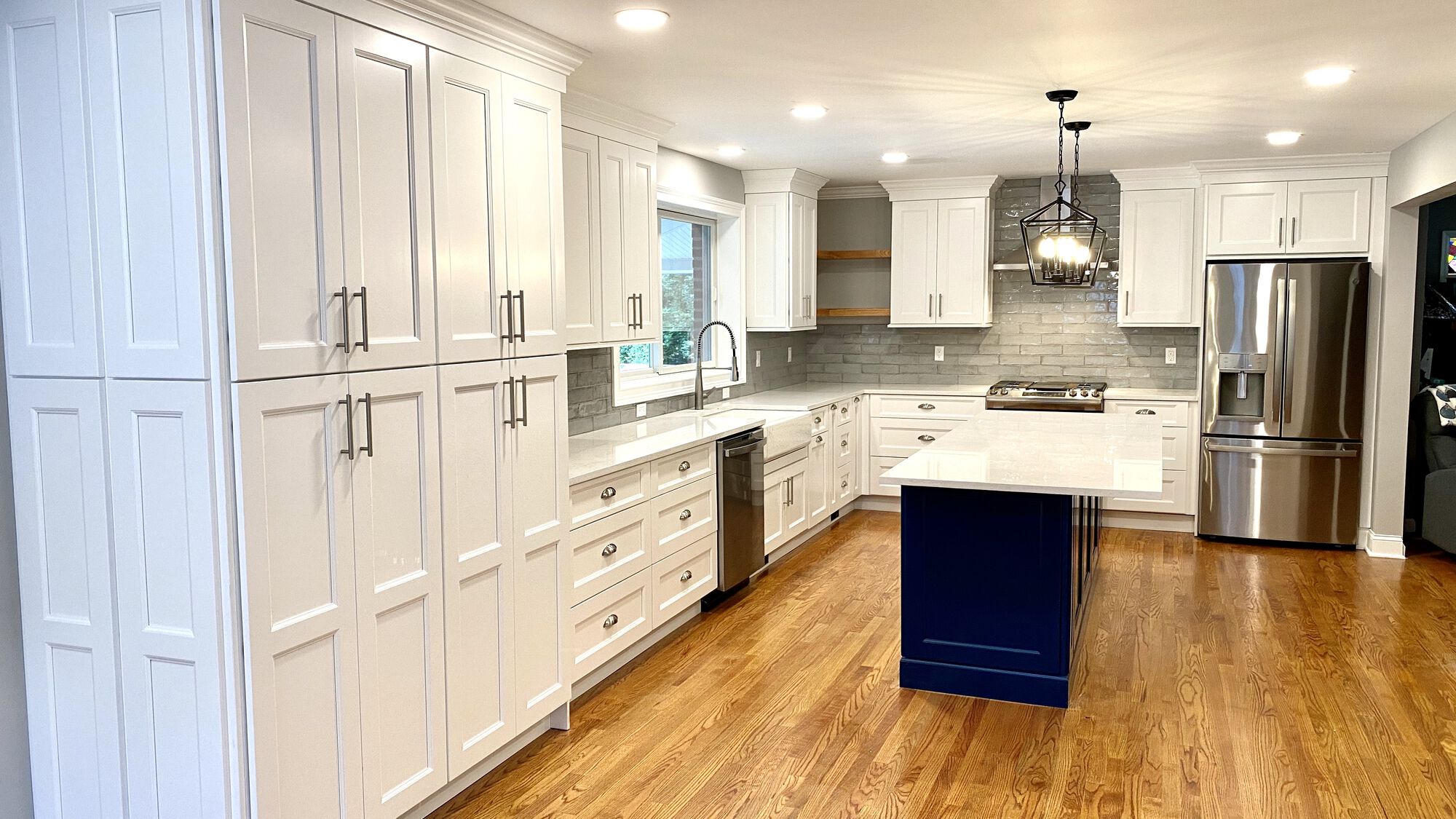 Kitchen Remodeling including Removing Wall Partitions, Oak Flooring, New Window Openings, Fabuwood cabinets, Quartz Tops, Andersen Windows in Bloomfield, Essex County NJ
