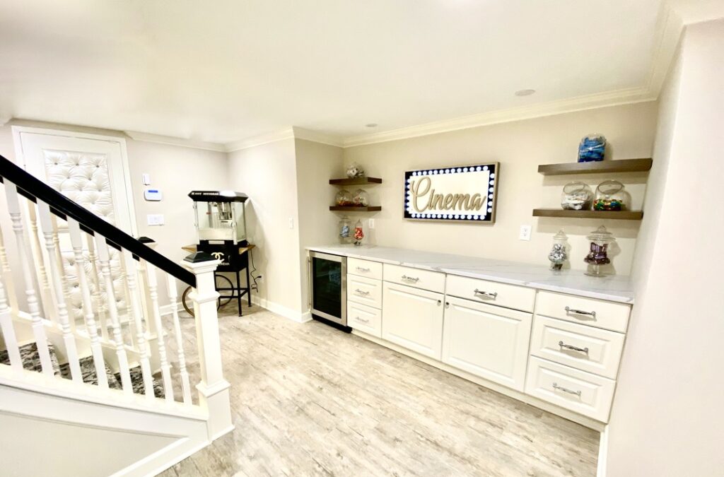 Basement renovation with a light white theme.