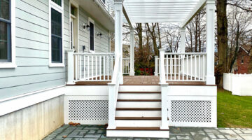 New wood composite deck with stone patio