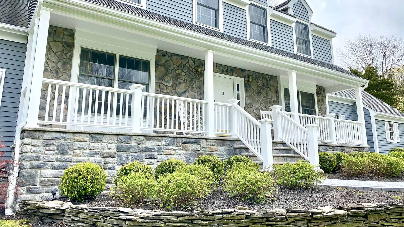 Layered Front Door Mats on Concrete Pavers - Transitional - Porch