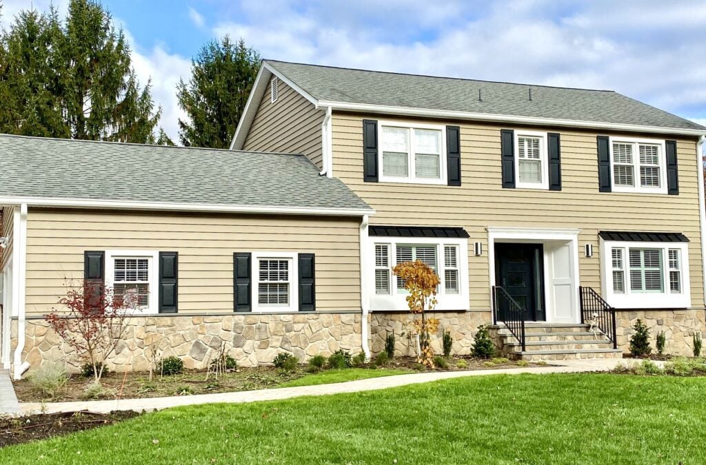 Prodigy Siding Tuscan Clay, Boral Dressed Fieldstone, Black Metal Roofing, Azek Trim, Therma Tru Front Door, Cambridge Pavers Walkway and Driveway in Randolph, Morris County NJ