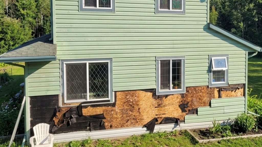 #2 You're Seeing Signs of Under Siding Damage